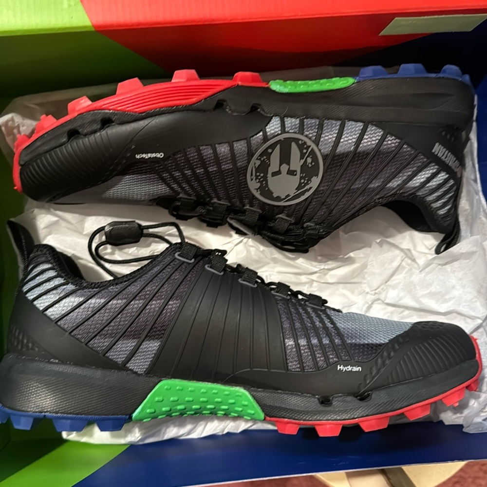 Black Athletic Shoes with Red and Green Highlights